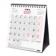 Calendari de sobretaula amb espai per anotar a les caselles. 
Enquadernat amb e...